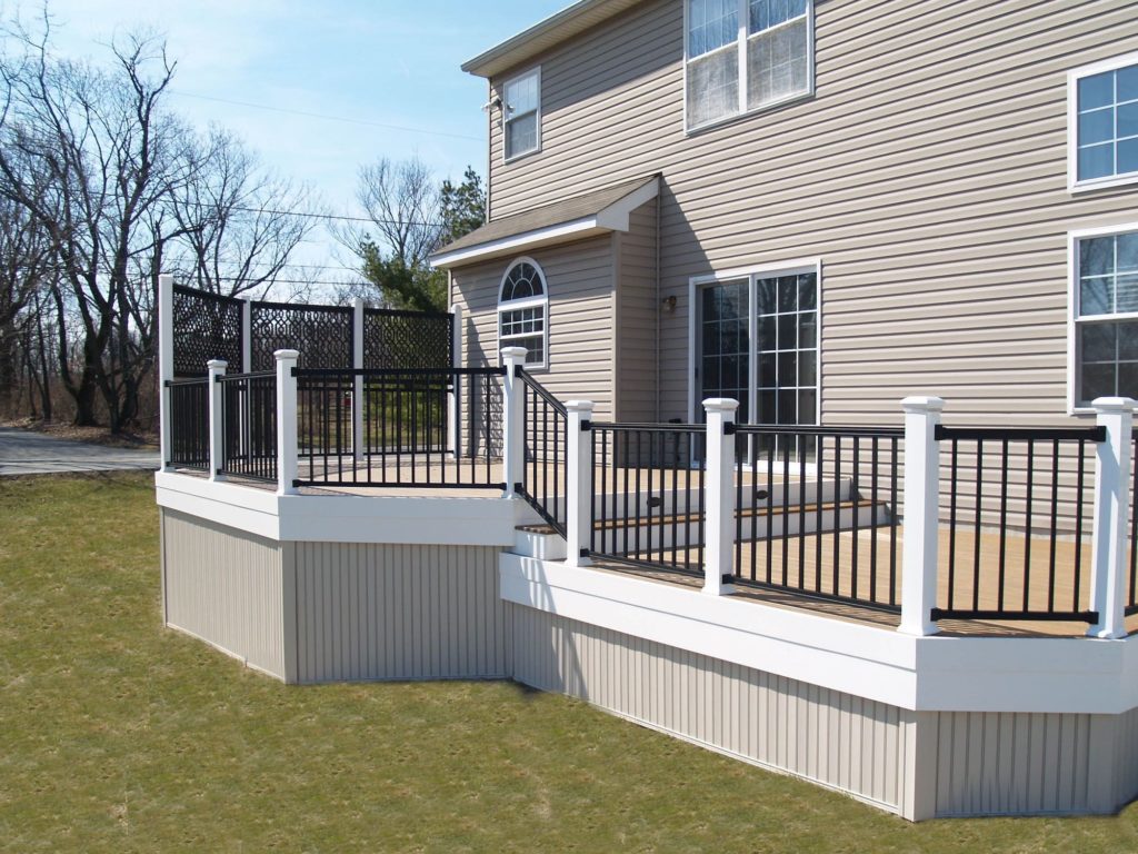New Deck with white banisters and black guard rails from McHenry Decks.